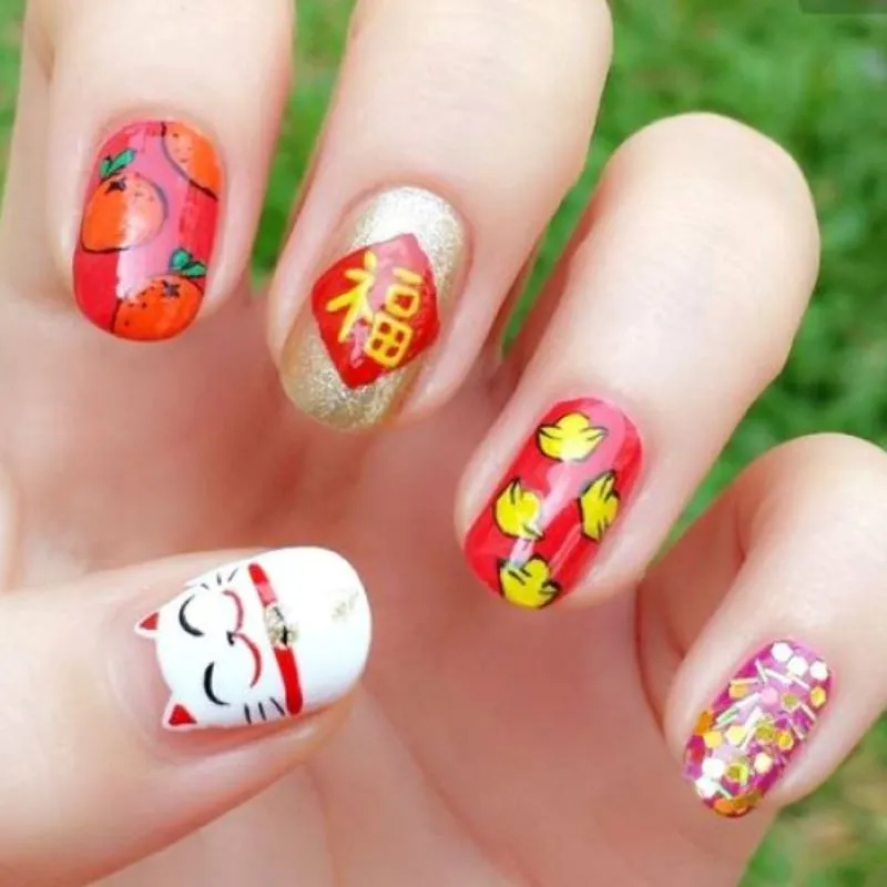 Top nail Tết con mèo may mắn đầu năm